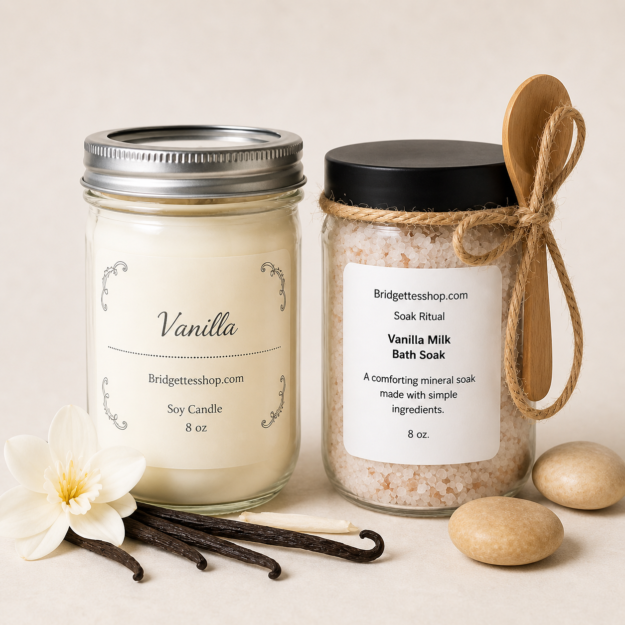Vanilla candle and bath soak with vanilla beans and flowers on a neutral background