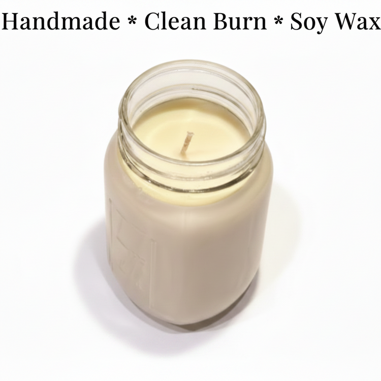 Handmade soy wax candle in a glass jar on a marble surface with text overlay.