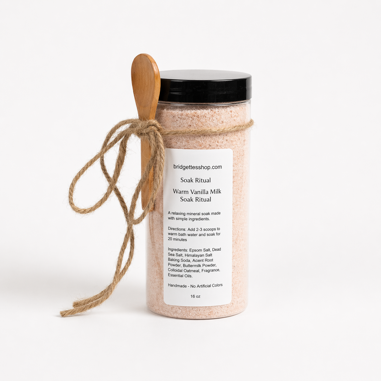Jar of 'Warm Vanilla Milk' Soak Ritual with a wooden spoon on a white background