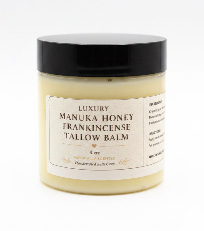 Manuka Honey Frankincense Tallow Balm jar with black lid on a white background