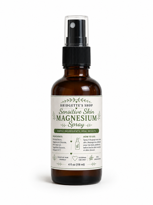 A 4 fl oz amber glass spray bottle of Bridgette's Shop Sensitive Skin Magnesium Spray with a black pump and a cream-colored label, set against a plain white background.