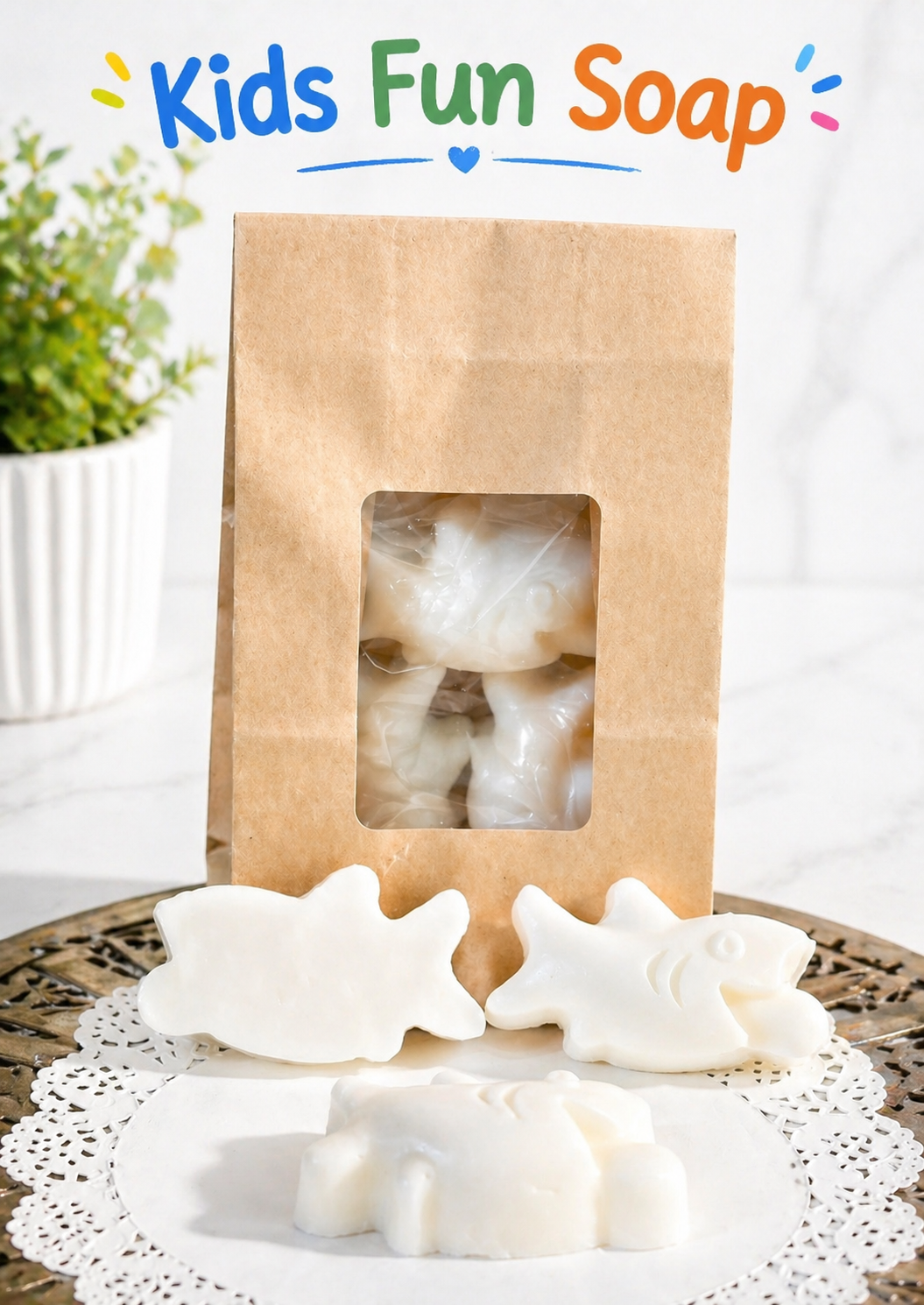 White soap shaped like fish on a white doily with 'Kids Fun Soap' packaging in the background.