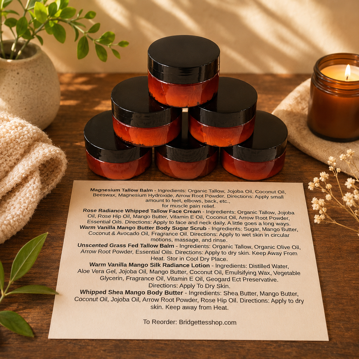 Stack of small jars with black lids on a wooden surface with a product list in front.