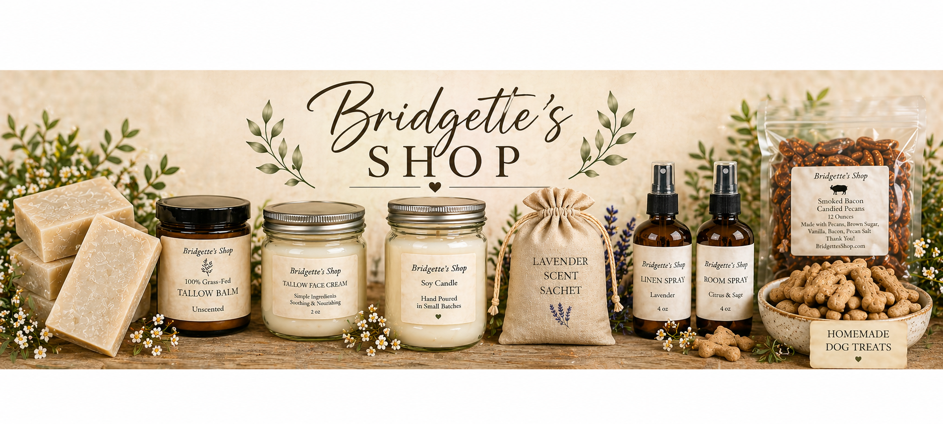 Bridgette's Shop with candles, soap, and other products on a wooden surface.